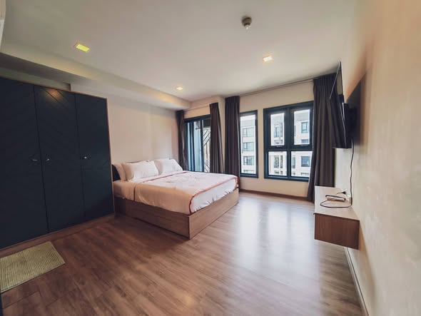 bedroom and room interior of THE BASE Sukhumvit 50