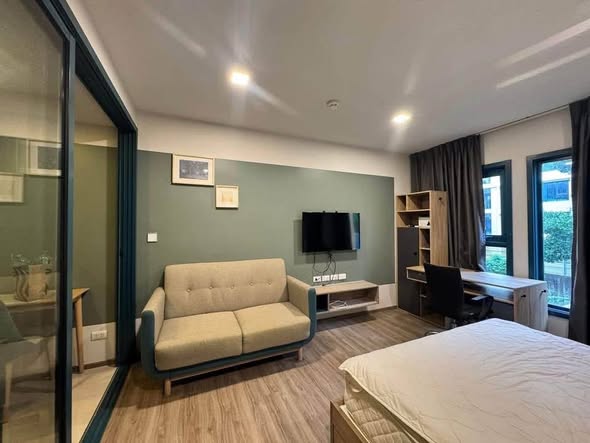 bedroom and room interior of THE BASE Sukhumvit 50