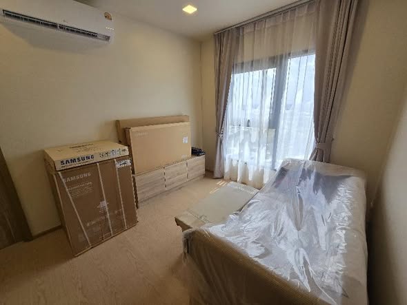 bedroom of The Base Urban Rama9