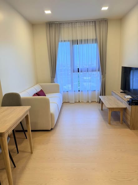 living room and bedroom of The Base Urban Rama9