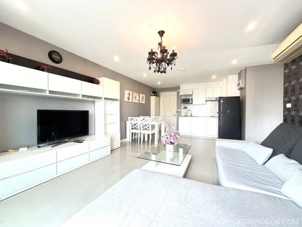 bedroom and living room of The Clover