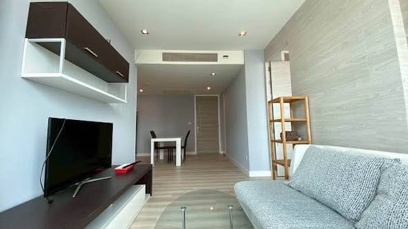 living room and bedroom of The Coast Bangkok