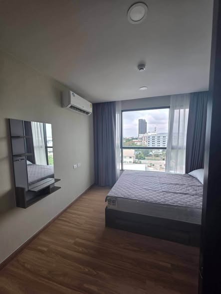 bedroom of The Cube Loft Srinakarin