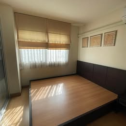 bedroom and room interior of The Fifth Avenue Condominium