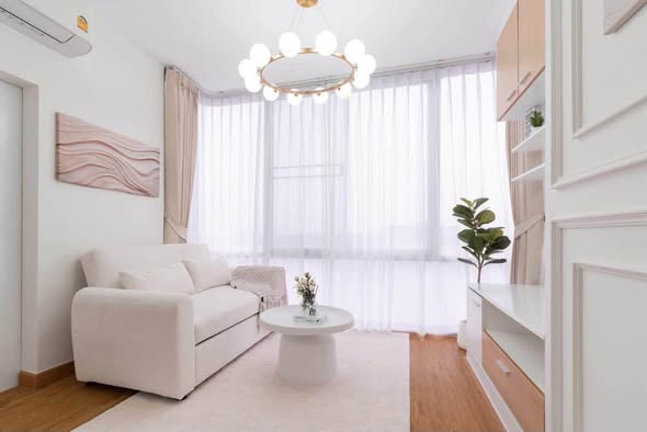 living room and bedroom of The Iris Condo (F Building) Rama 9 – Srinagarindra