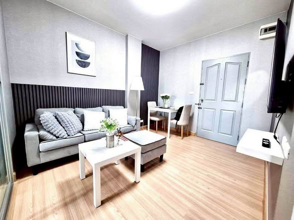 bedroom and living room of The Kith Plus Sukhumvit 113