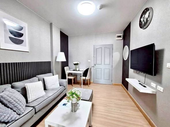living room and bedroom of The Kith Plus Sukhumvit 113
