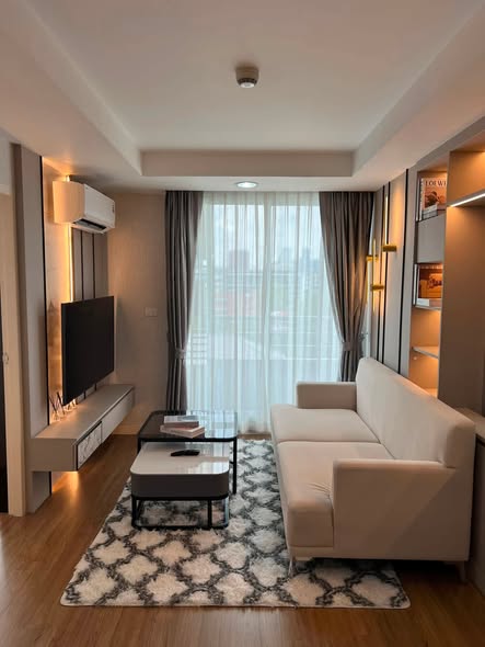 living room and bedroom of The Kris 5 Ratchada 17
