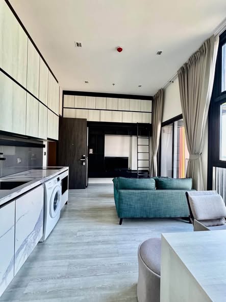 living room and room interior and kitchen of THE LINE Sukhumvit 101