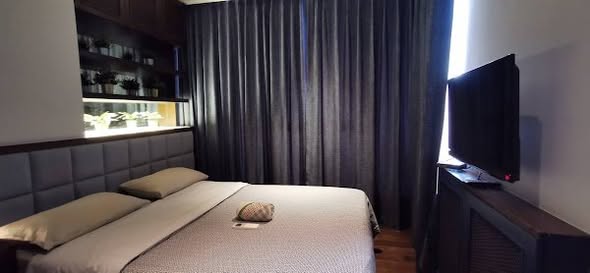 bedroom of The Lumpini 24