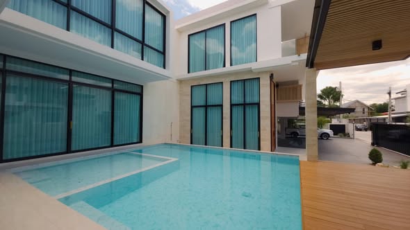 pool and room interior of The Master Ekkamai-Ramintra
