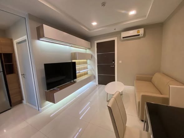 bedroom of The Metropolis Samrong
