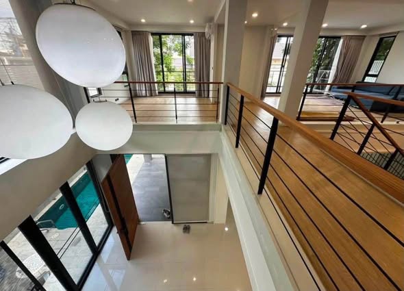 living room and room interior of บ้านพักหัวหิน The Modern Pool Villa