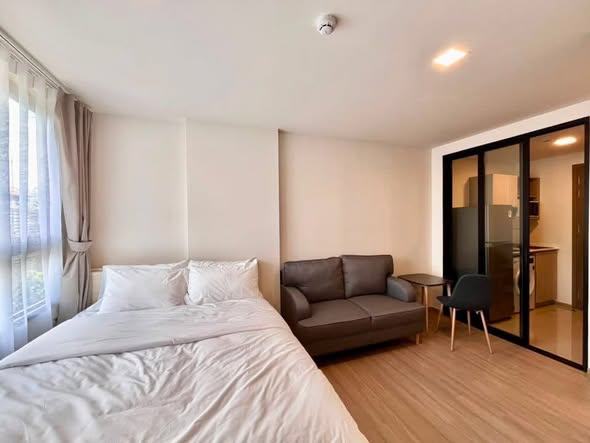bedroom and room interior of THE MUVE Sukhumvit 107