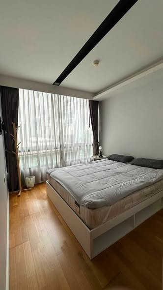 bedroom of The Nest Ploenchit