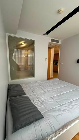 bedroom of The Nest Ploenchit
