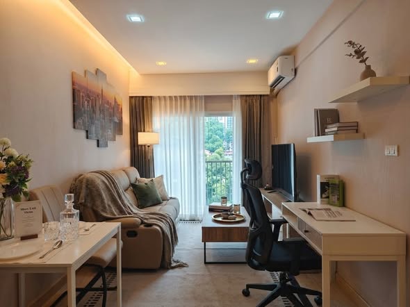 living room and bedroom of The New Concept Boutique Condo