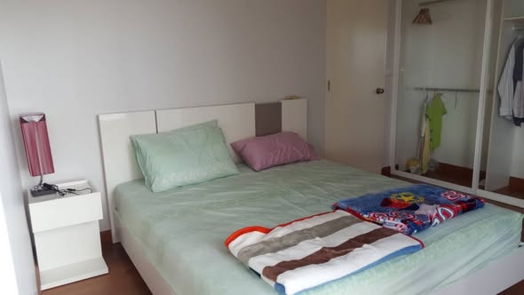 bedroom of The Parkland Ratchada-Tha Phra