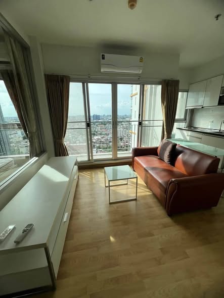 bedroom and living room of The Parkland Taksin -Tha Phra