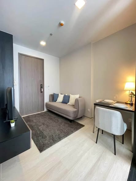 bedroom and living room of The Privacy Jatujak
