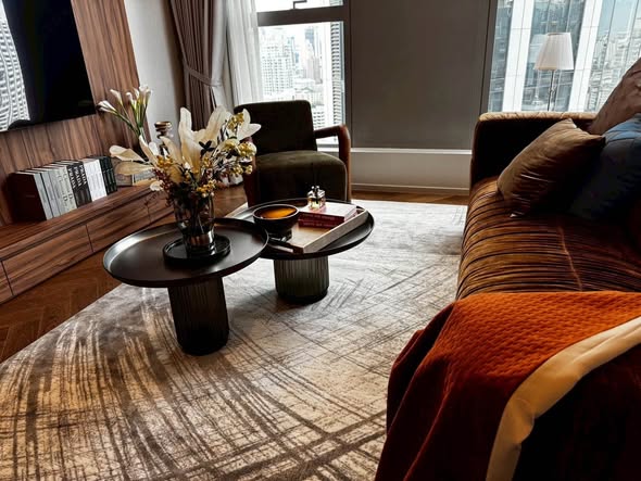 bedroom and living room of The Residences 38