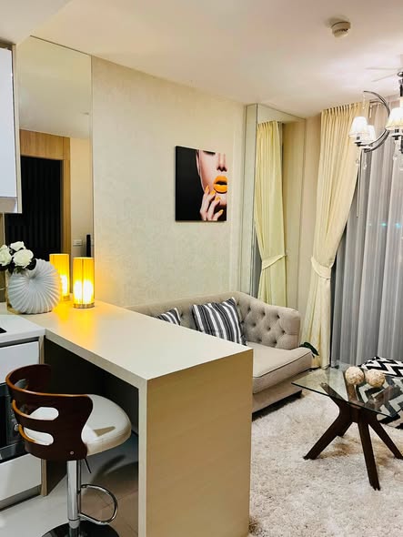 bedroom and bathroom of The Riviera Jomtien