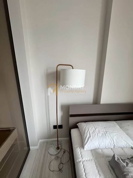 bedroom of The Room Phaya Thai