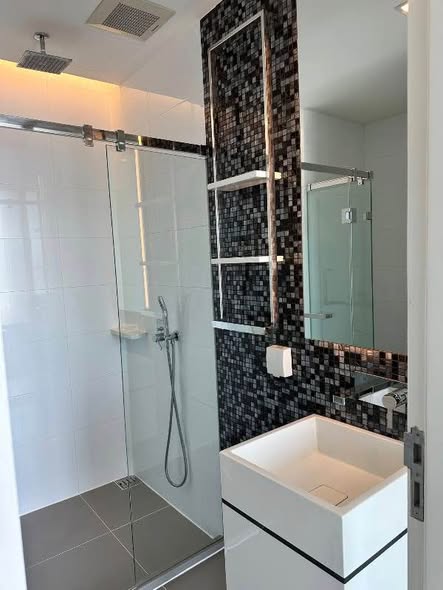 room interior and bathroom of The Room Sukhumvit 69