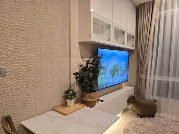 living room and bathroom of The Sky Sukhumvit