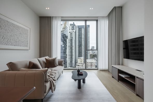 bedroom and living room of The Strand Thonglor