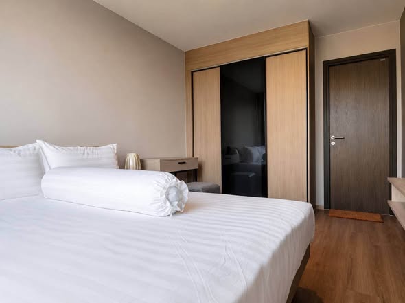 bedroom of The TEAK Sukhumvit 39