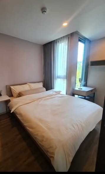 bedroom of The TEAK Sukhumvit 39