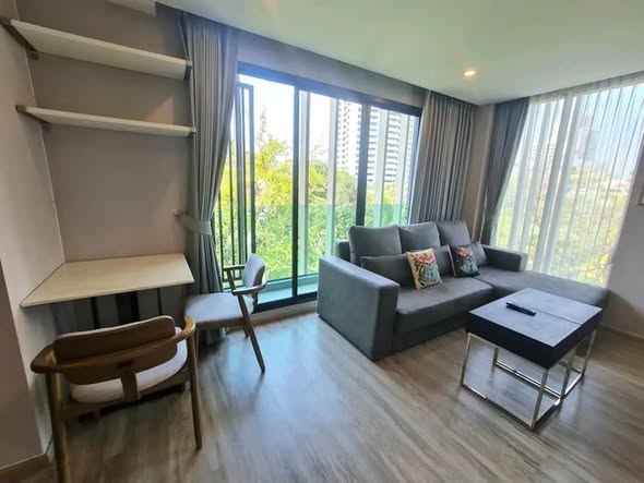 bedroom and living room of The TEAK Sukhumvit 39