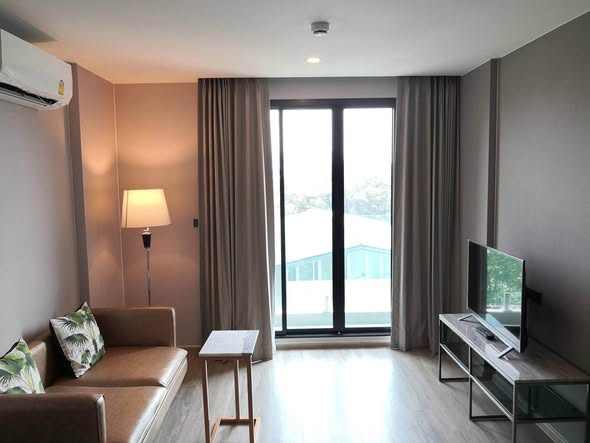 living room and bedroom of The TEAK Sukhumvit 39