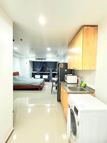 bedroom of The Trendy Condominium