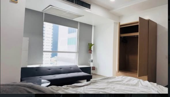 bedroom of The Trendy Condominium
