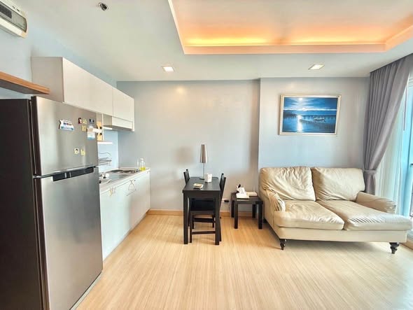 bedroom and living room of Thru Thong Lor