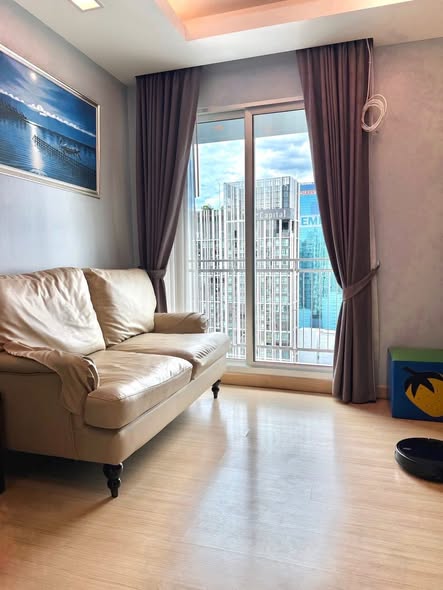 living room and bedroom of Thru Thong Lor