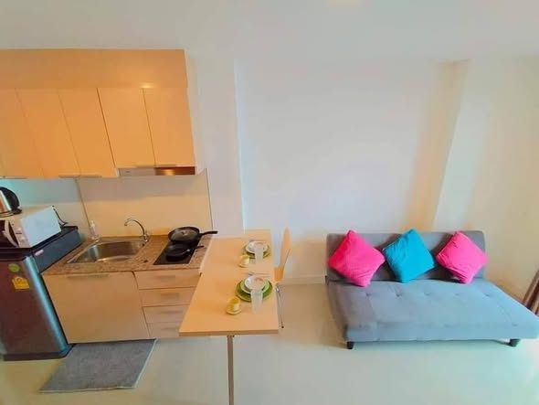 bedroom and living room of Triogems condo