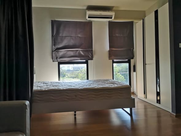 bedroom and room interior of UNiO Sukhumvit 72
