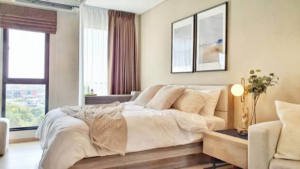 bedroom and living room of Unio Sukhumvit 72 Phase 2 Building A