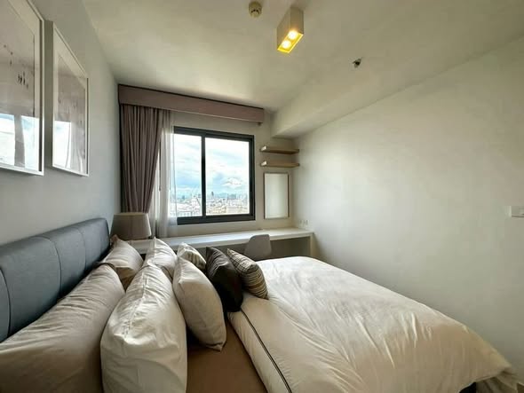 bedroom and living room of Unixx South Pattaya Condominium