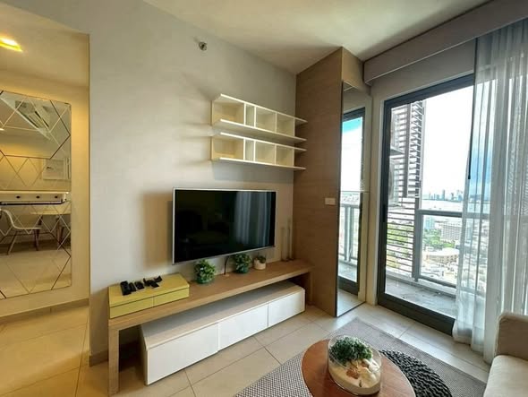 living room and bedroom of Unixx South Pattaya Condominium