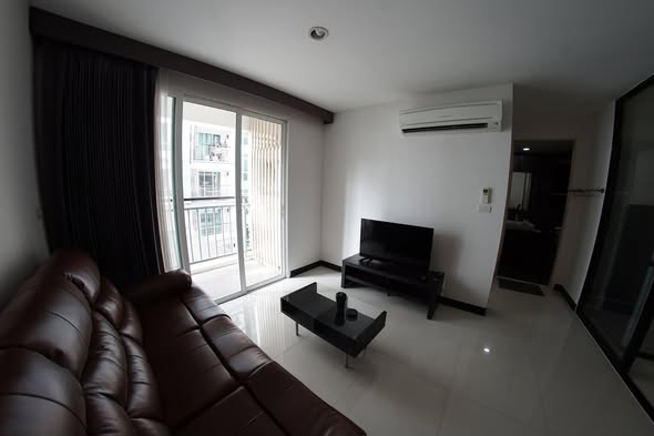 bedroom and living room of Voque Sukhumvit 16 Residential Condominium