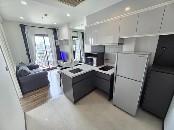 bedroom and kitchen of WYNE by Sansiri