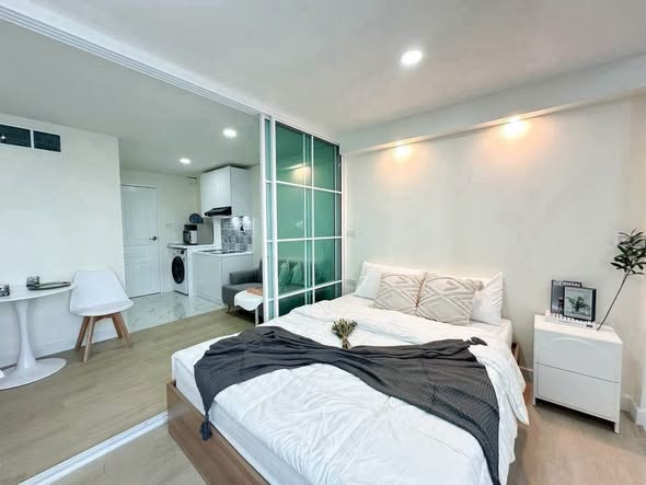 bedroom of 103 Condominium 5