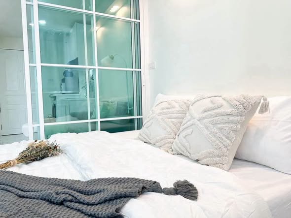 bedroom of 103 Condominium 5