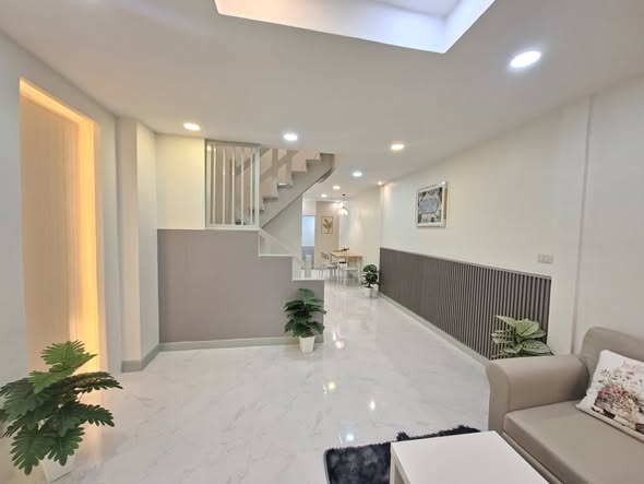 living room of หมู่บ้านดิเอมเมอรัลด์พาร์ค 2