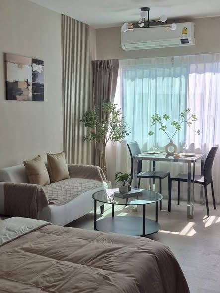 living room and bedroom of A Space ME Sukhumvit 77