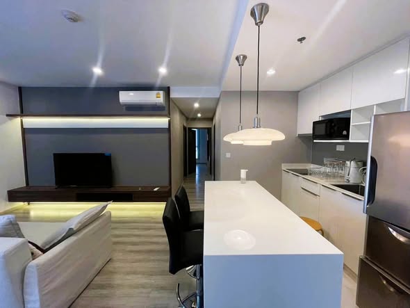 living room and kitchen of AGT Venture ( Thailand )